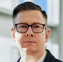 Photo d'Alexander Hughes, PDG d'une entreprise spécialisée dans le trading de crypto